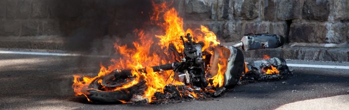 motorcycle burning after accident 698 x221